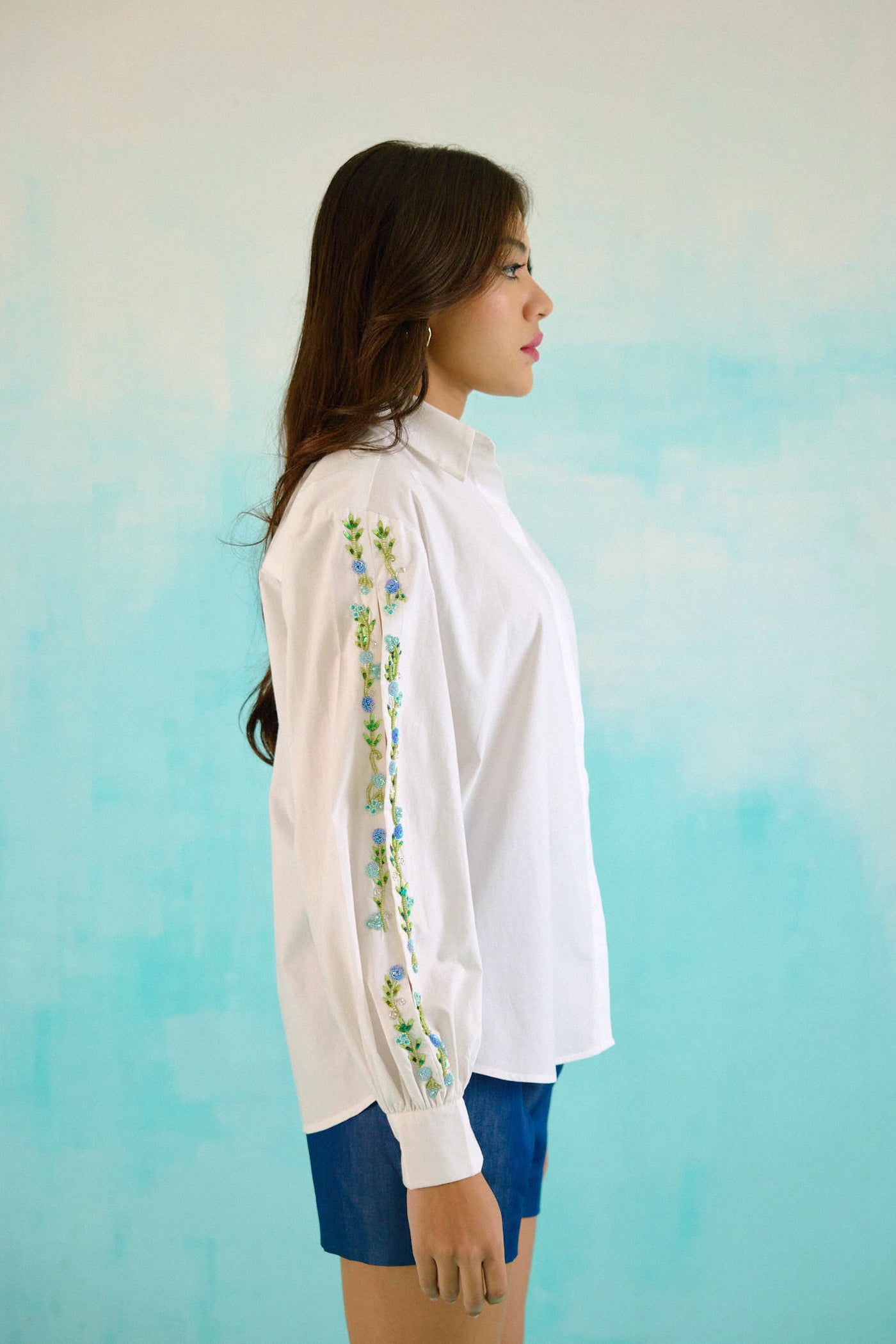 White hand embroidered blue sequins upbeat shirt